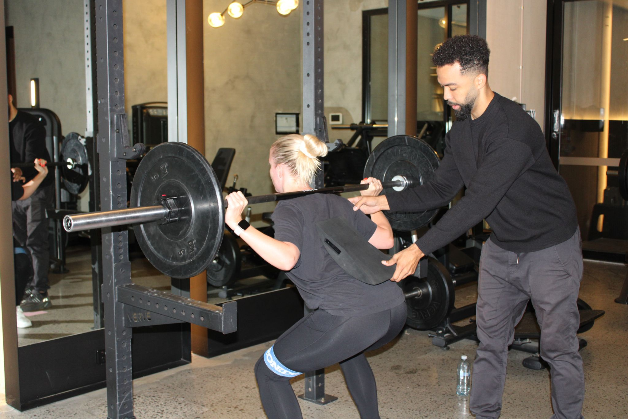 Squat technique coaching using EZBACKPRO